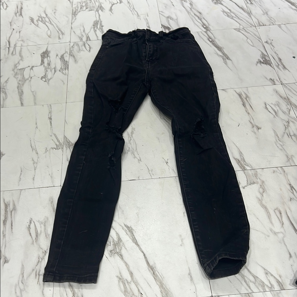 Woman’s Black Distressed Jeans